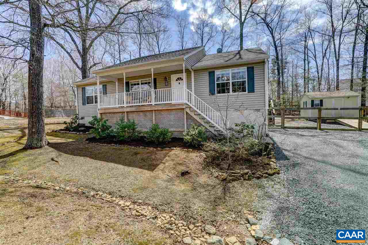 7 Haversack Road Palmyra, VA 22963 - Photo 3 of 32 a front view of a house with garden