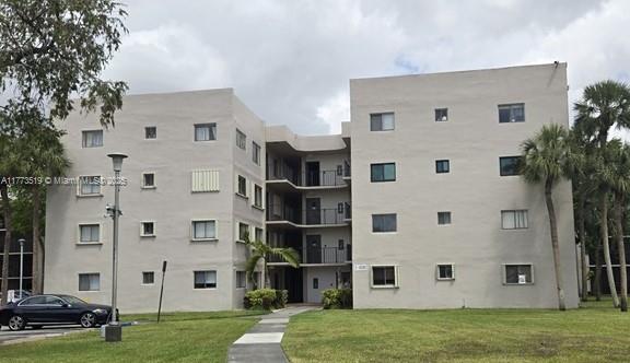 a view of building with yard