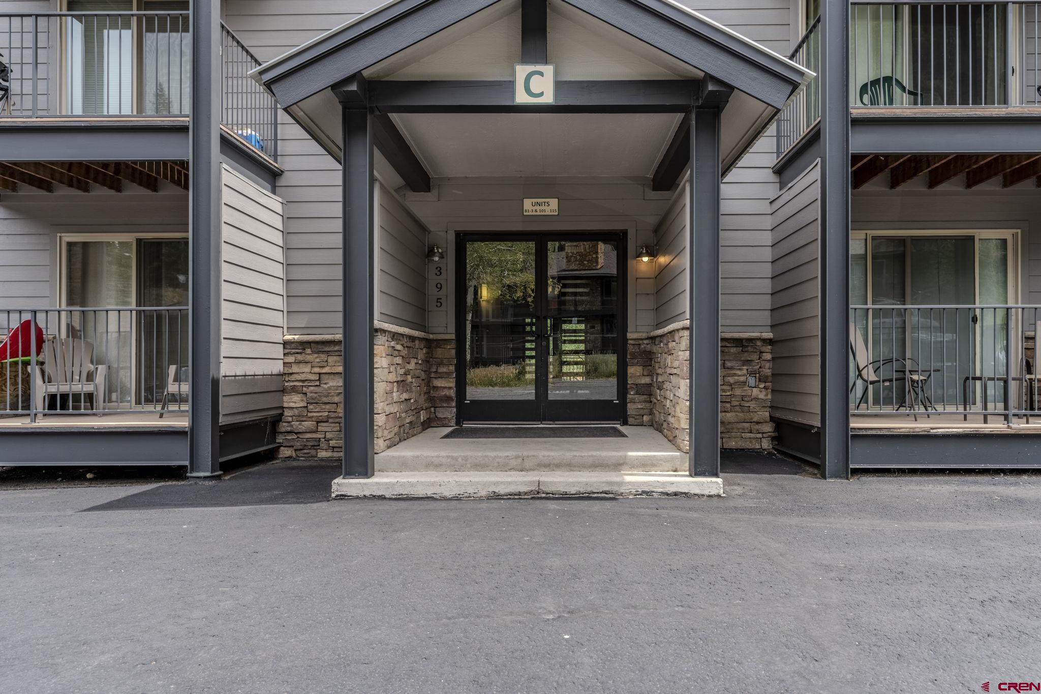395 Sheol Street, Unit 109 Durango, CO 81301 - Photo 2 of 30 a view of a house with a door and wooden floor