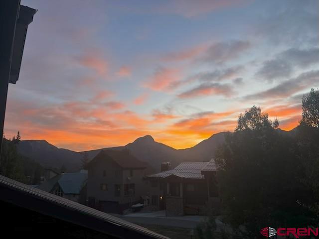 395 Sheol Street, Unit 109 Durango, CO 81301 - Photo 21 of 30 a view of a house with a mountain in the background