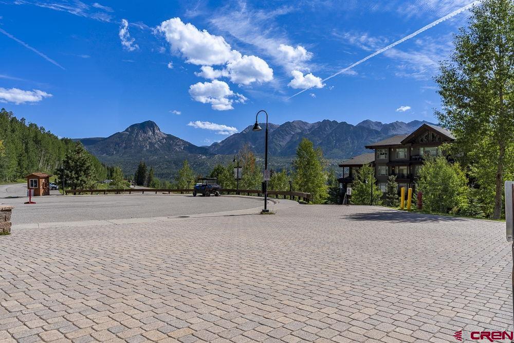 395 Sheol Street, Unit 109 Durango, CO 81301 - Photo 24 of 30 a view of a house with a yard and tree