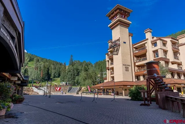 a view of a swimming pool with a yard