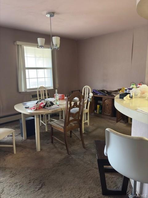 1338 Robin Lane, Unit 1212 Queens, NY 11360 - Photo 16 of 22 a dining room with furniture and window