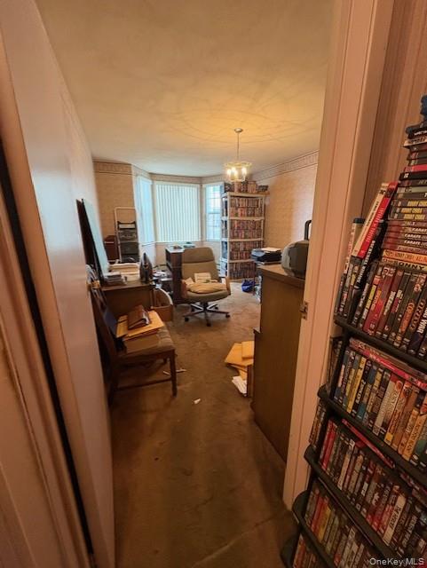 1338 Robin Lane, Unit 1212 Queens, NY 11360 - Photo 21 of 22 a living room with furniture and a fireplace