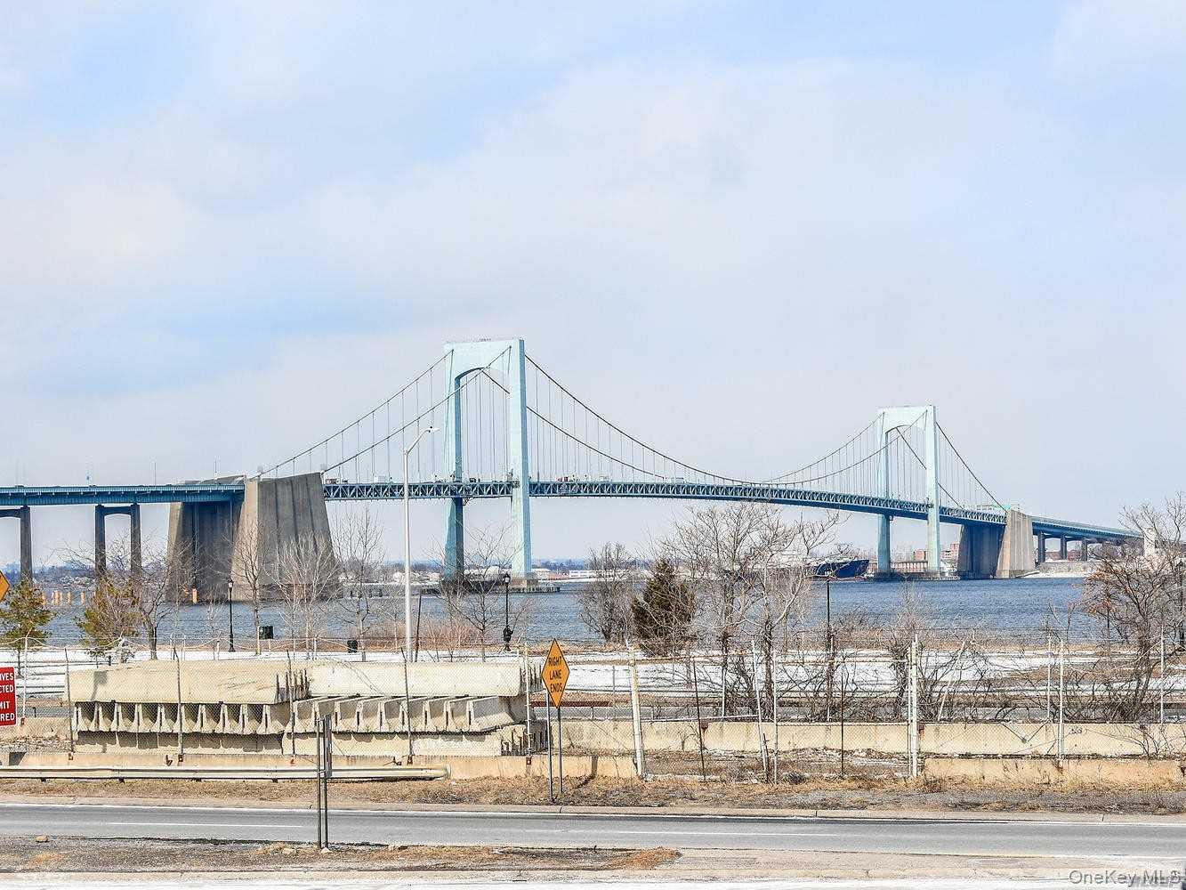 1338 Robin Lane, Unit 1212 Queens, NY 11360 - Photo 3 of 22 a front view of a house