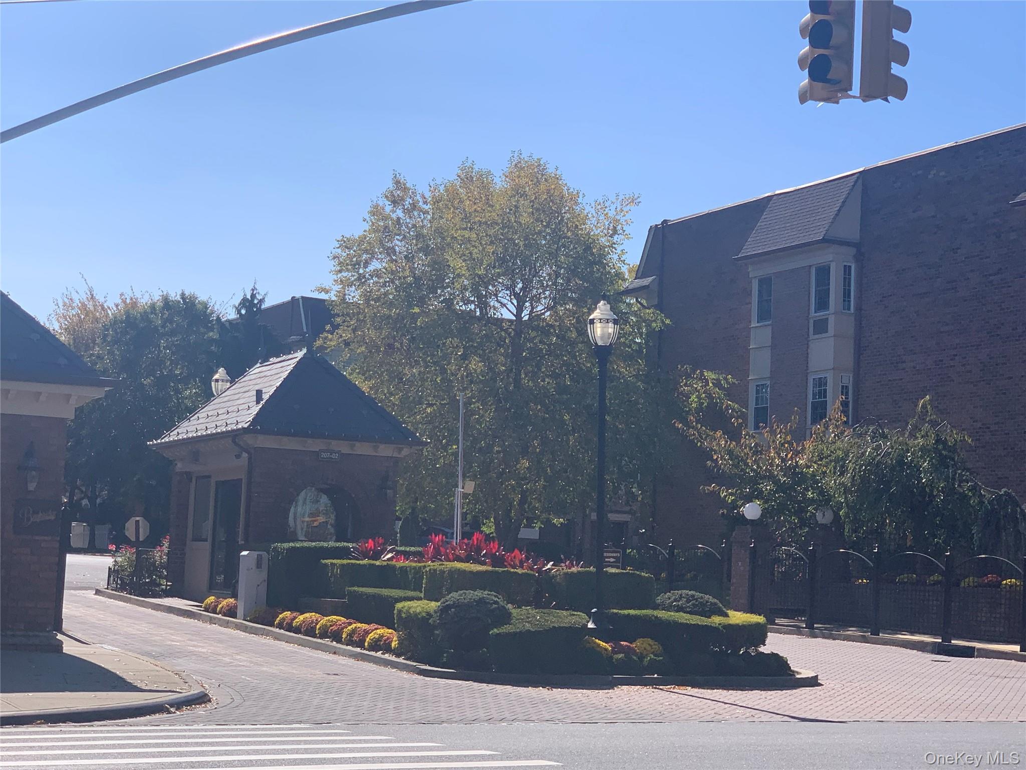 1338 Robin Lane, Unit 1212 Queens, NY 11360 - Photo 4 of 22 a view of a house with a yard