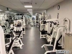 1338 Robin Lane, Unit 1212 Queens, NY 11360 - Photo 6 of 22 a view of a room with gym equipment