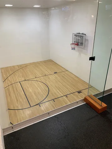 a view of an entryway with a floor to ceiling window and stairs