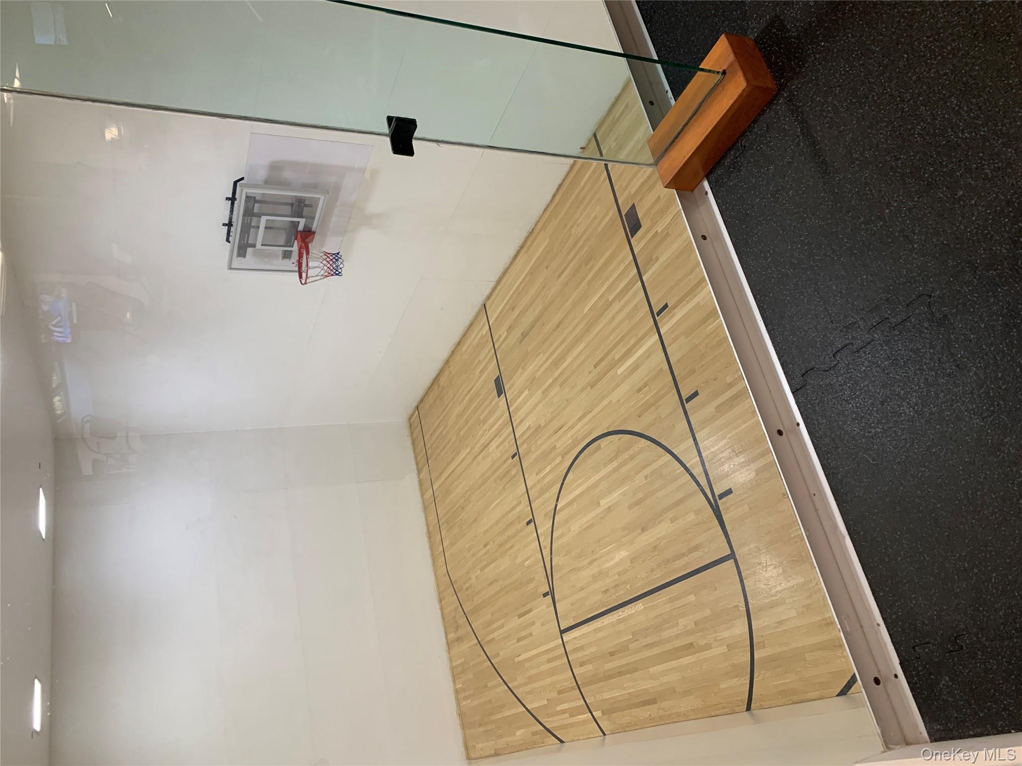 1338 Robin Lane, Unit 1212 Queens, NY 11360 - Photo 10 of 22 a bedroom with a bed and a table