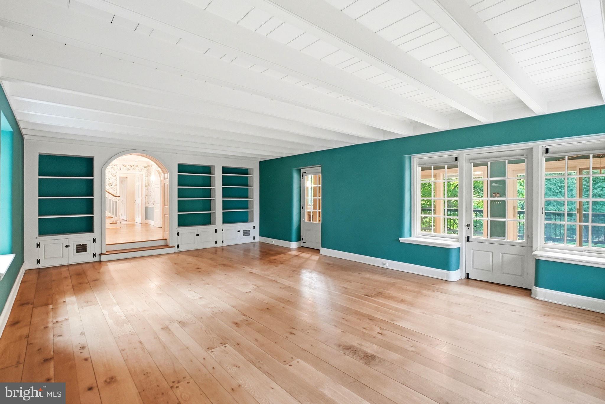 419 Riverview Road Swarthmore, PA 19081 - Photo 10 of 70 a view of a livingroom with wooden floor and a large window