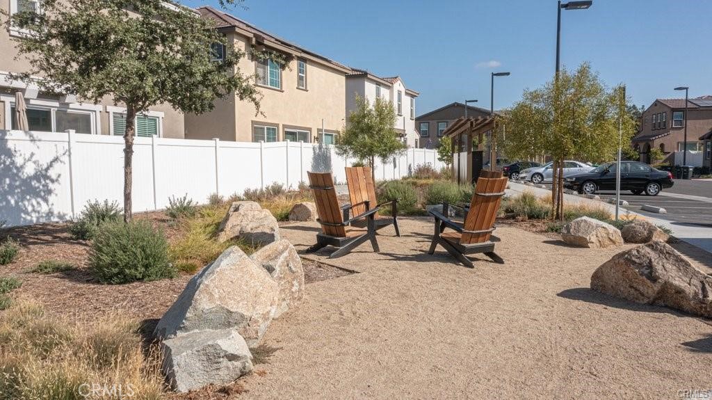 28267 Ashtree Street Temecula, CA 92591 - Photo 41 of 41 a view of a patio with dining table and chairs