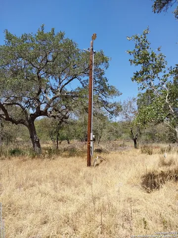 a view of a house with a snow in the background
