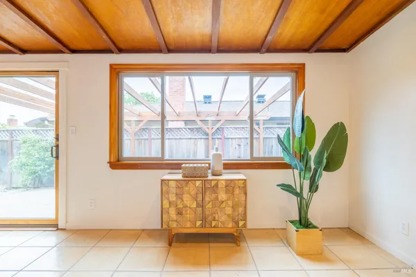 a potted plant sitting in front of a door