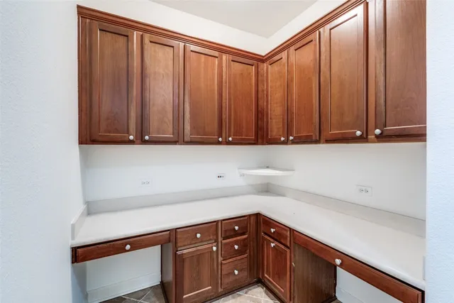 a view of cabinets with wooden floor