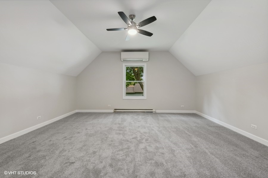 452 Mildred Avenue Cary, IL 60013 - Photo 11 of 20 wooden floor in an empty room with a window