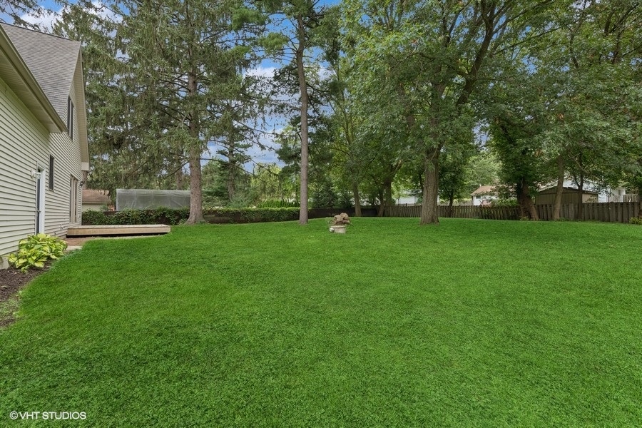452 Mildred Avenue Cary, IL 60013 - Photo 16 of 20 a view of a park with trees in the background