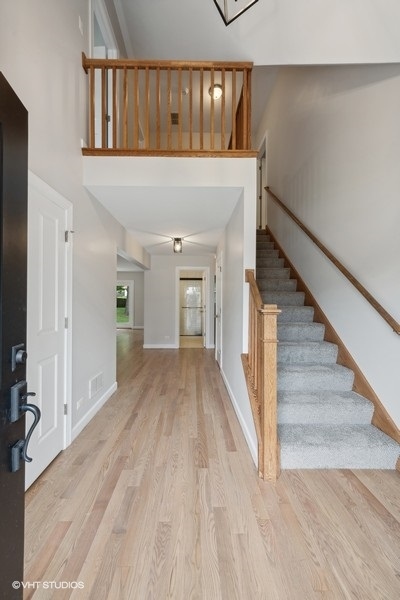 452 Mildred Avenue Cary, IL 60013 - Photo 2 of 20 a view of a hallway with staircase