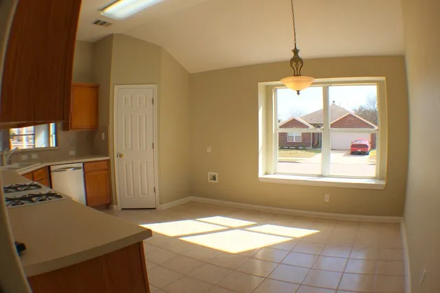 a view of a room with a window