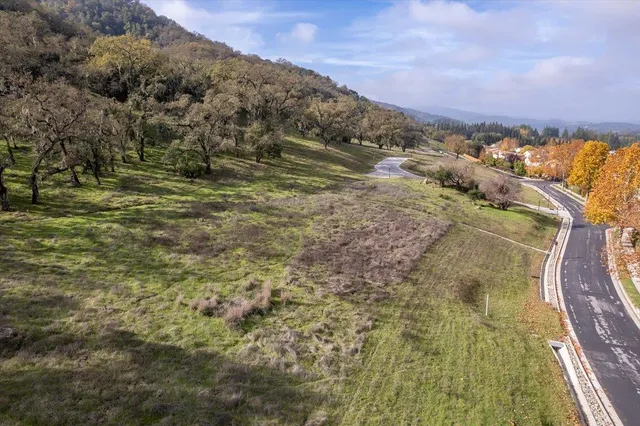 an aerial view of residential house and outdoor space