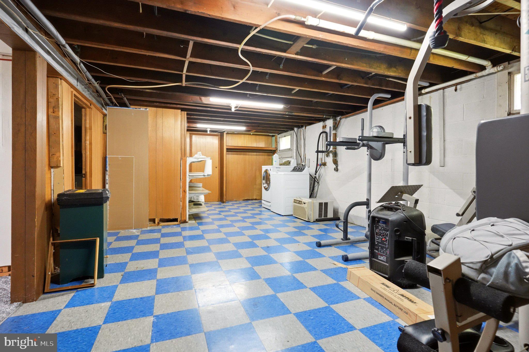 19 South Tilbury Road Salem, NJ 08079 - Photo 20 of 25 Spacious basement with checkerboard floor.