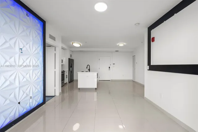 a view of a room with a hallway