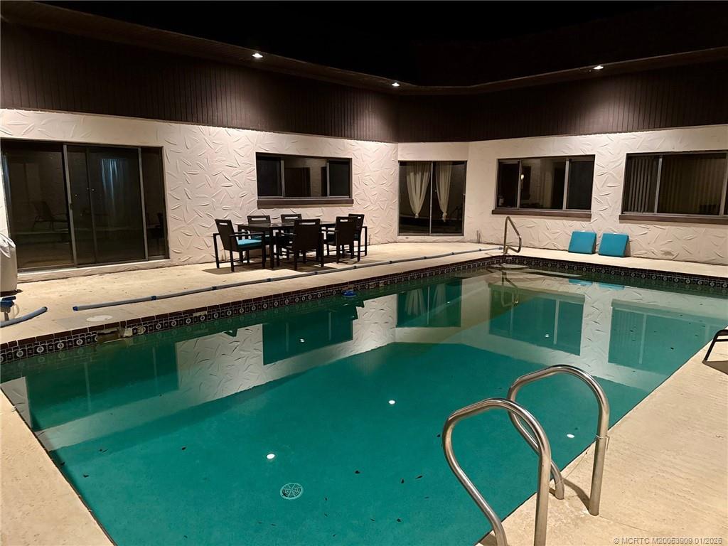 11165 Southwest Meadowlark Circle Stuart, FL 34997 - Photo 20 of 21 POOL AT NIGHT