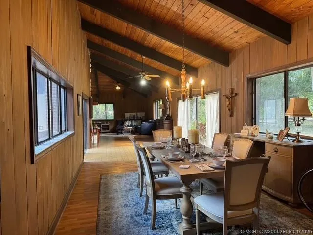 a view of a dining room with furniture
