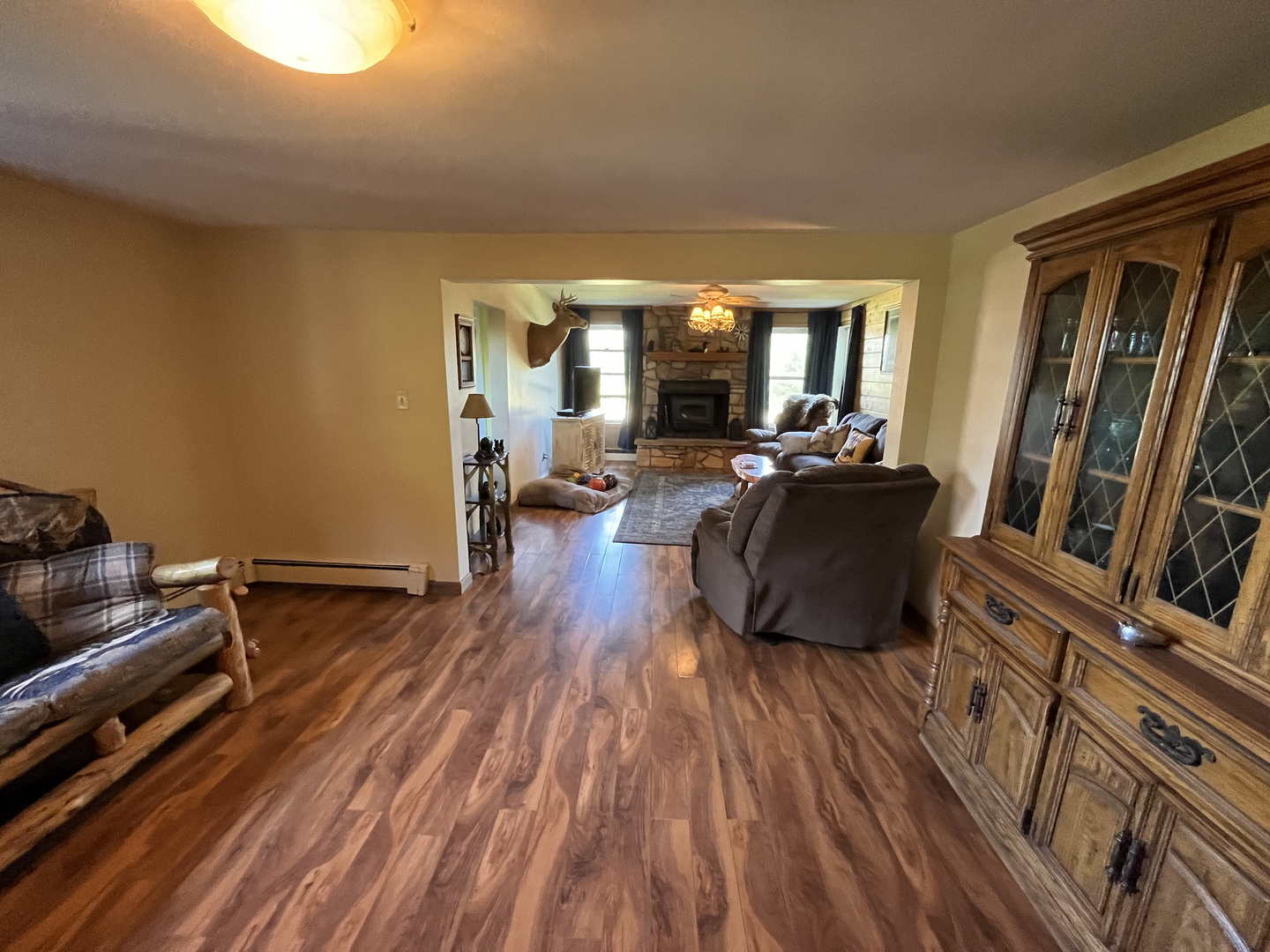 22670 Larson Road Sycamore, IL 60178 - Photo 9 of 41 a living room with furniture flat screen tv and wooden floor
