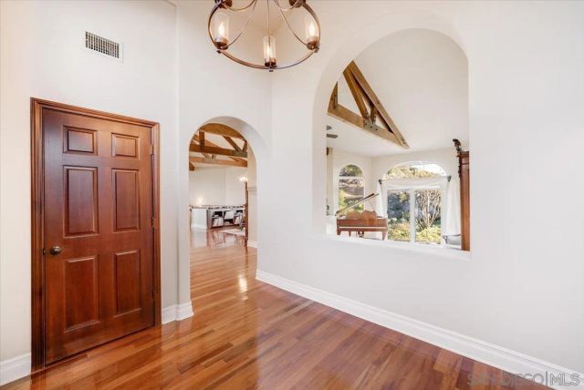 a view of a balcony with chair and table