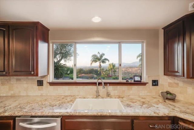 a view of a hallway with two washing machine