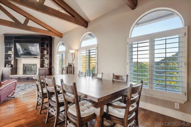 a white toilet next to a bathroom sink