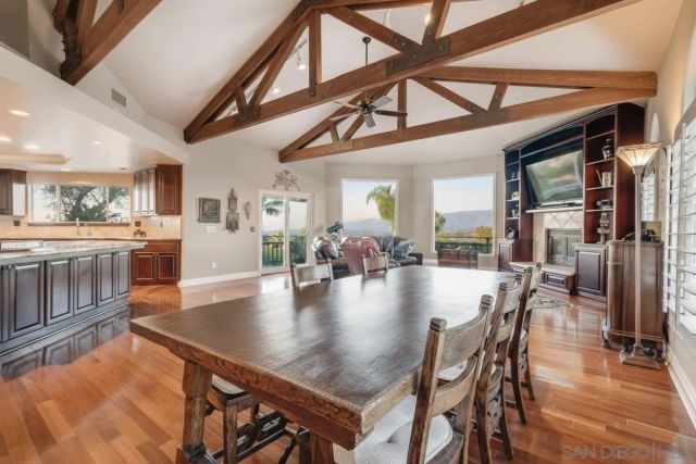 a kitchen with cabinets and window