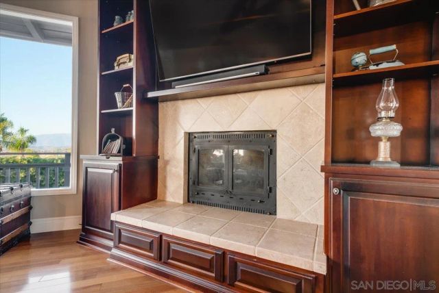 a bed room with furniture and a window