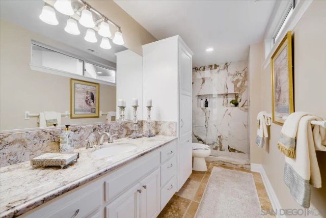 a view of a swimming pool in a backyard