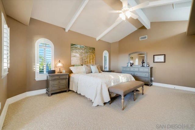 a bathroom with a toilet sink and shower