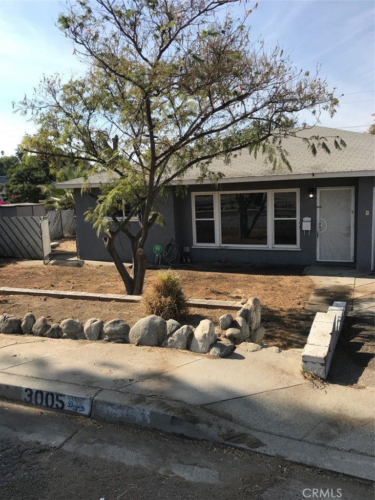 3005 Lecil Street Riverside, CA 92507 - Photo 1 of 1 a view of a house with a yard