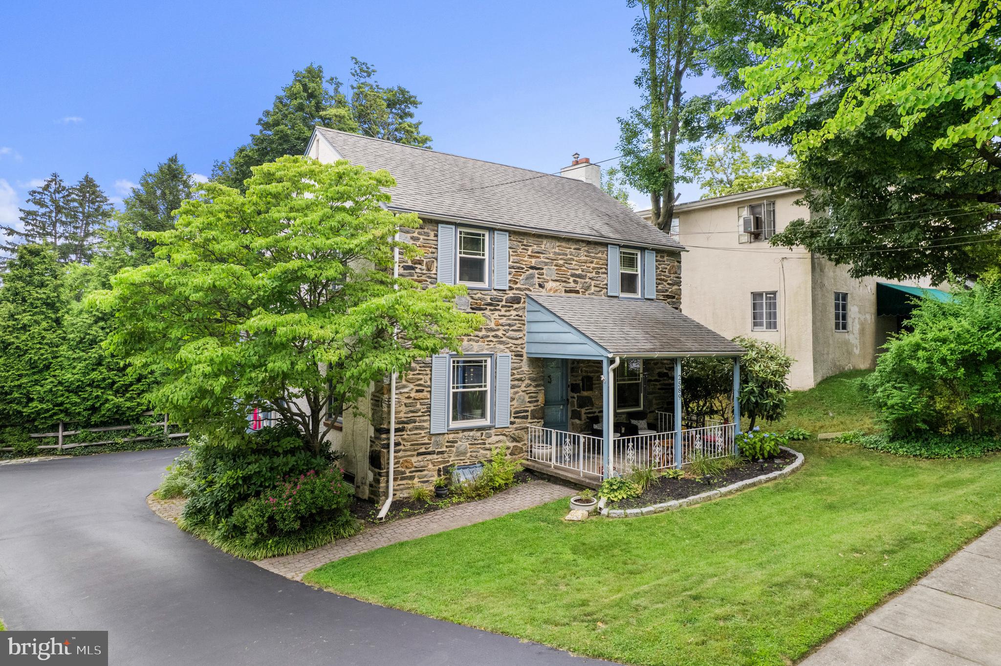 2589 Radcliffe Road Broomall, PA 19008 - Photo 2 of 34 a view of a house with a yard and potted plants