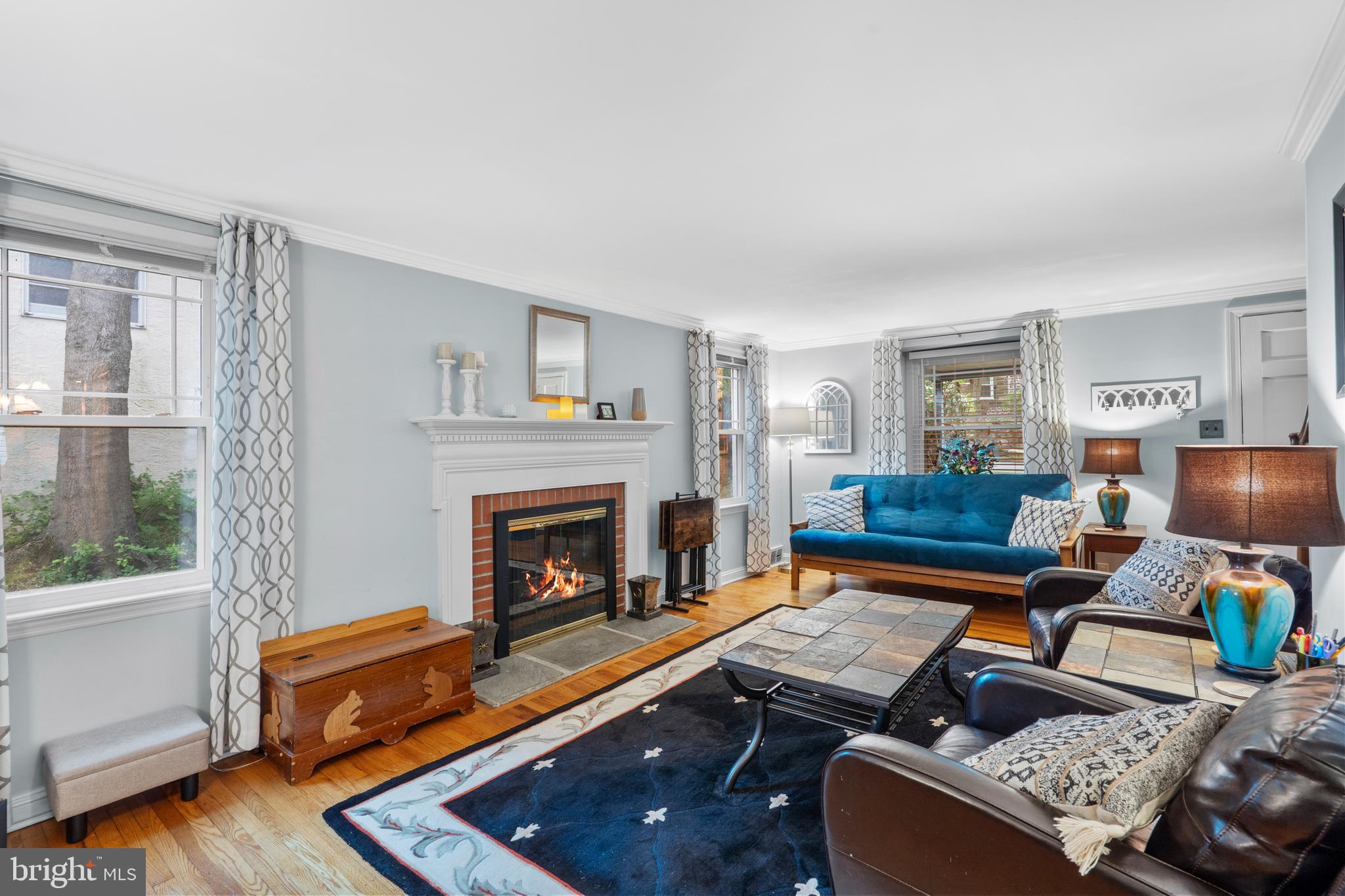 2589 Radcliffe Road Broomall, PA 19008 - Photo 5 of 34 a living room with furniture fireplace and window