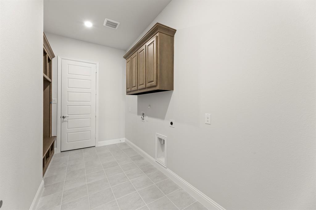 403 Spoonbill Road Sunnyvale, TX 75182 - Photo 16 of 34 a view of hallway with cabinets