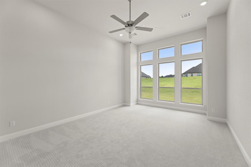 403 Spoonbill Road Sunnyvale, TX 75182 - Photo 18 of 34 a view of an empty room with a window