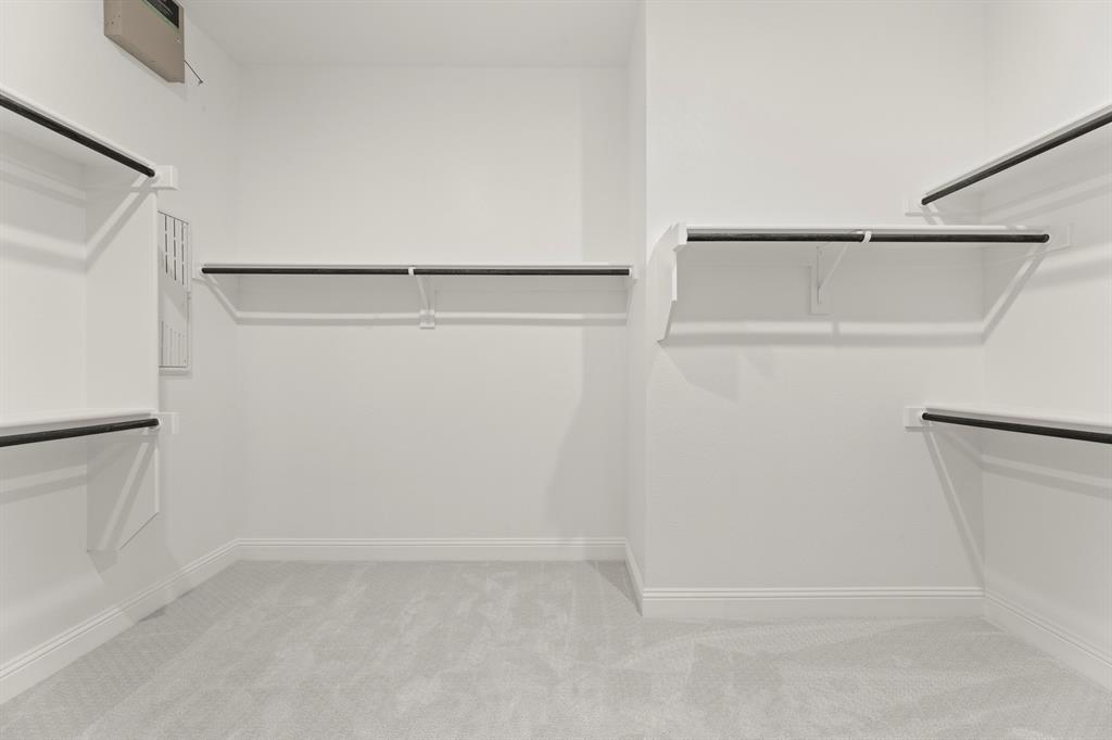403 Spoonbill Road Sunnyvale, TX 75182 - Photo 22 of 34 a view of an empty walk in closet