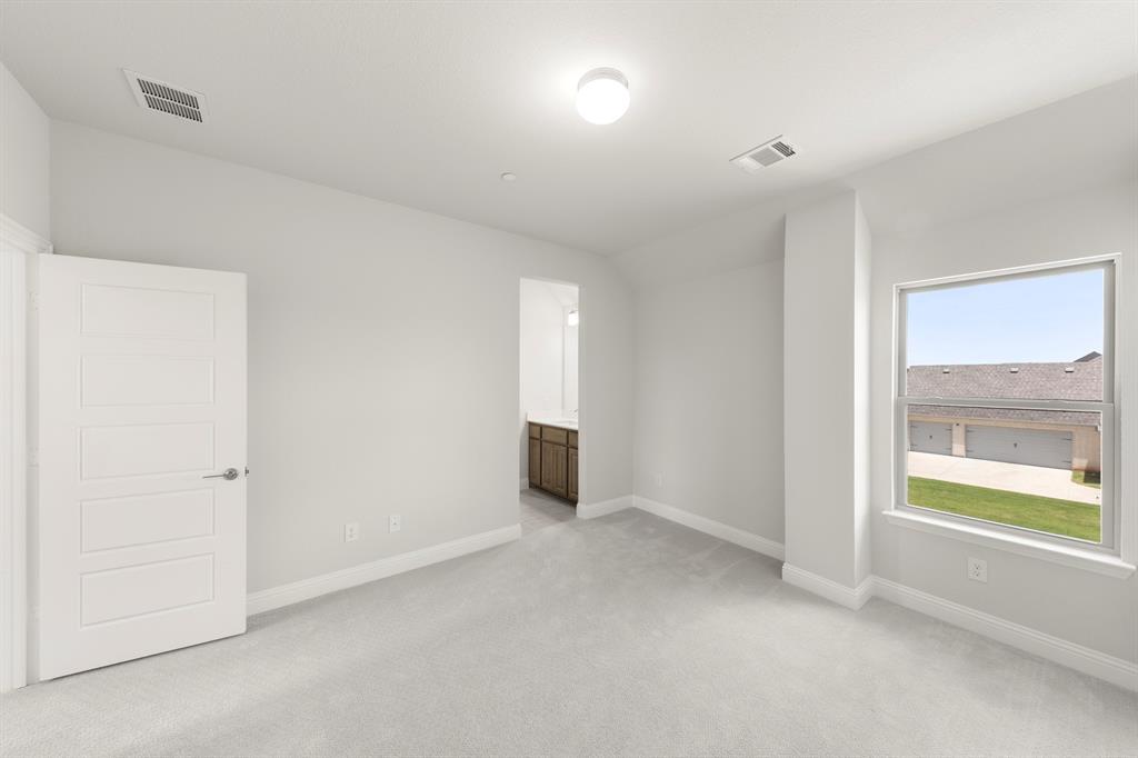 403 Spoonbill Road Sunnyvale, TX 75182 - Photo 27 of 34 a view of an empty room with a window