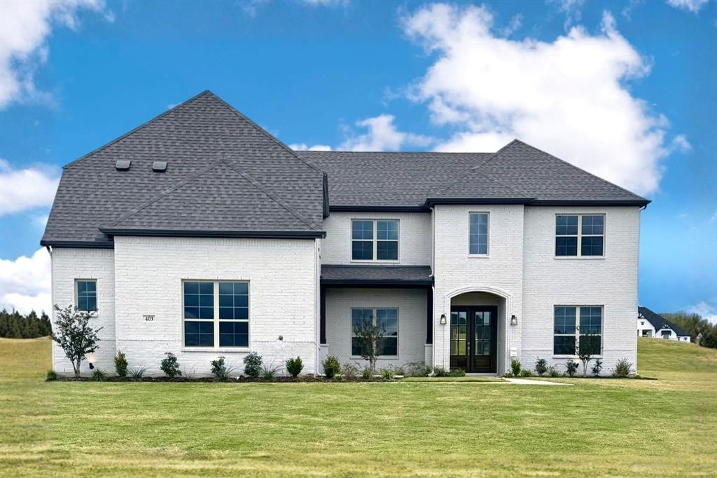 403 Spoonbill Road Sunnyvale, TX 75182 - Photo 32 of 34 a front view of a house with a yard