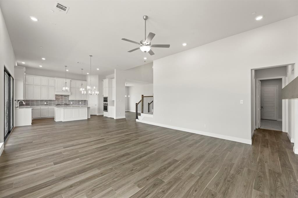 403 Spoonbill Road Sunnyvale, TX 75182 - Photo 8 of 34 a view of kitchen view wooden floor and window