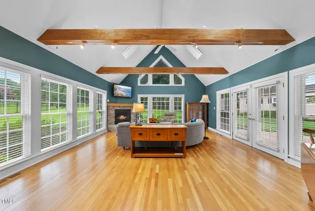 a kitchen with stainless steel appliances granite countertop a sink and cabinets