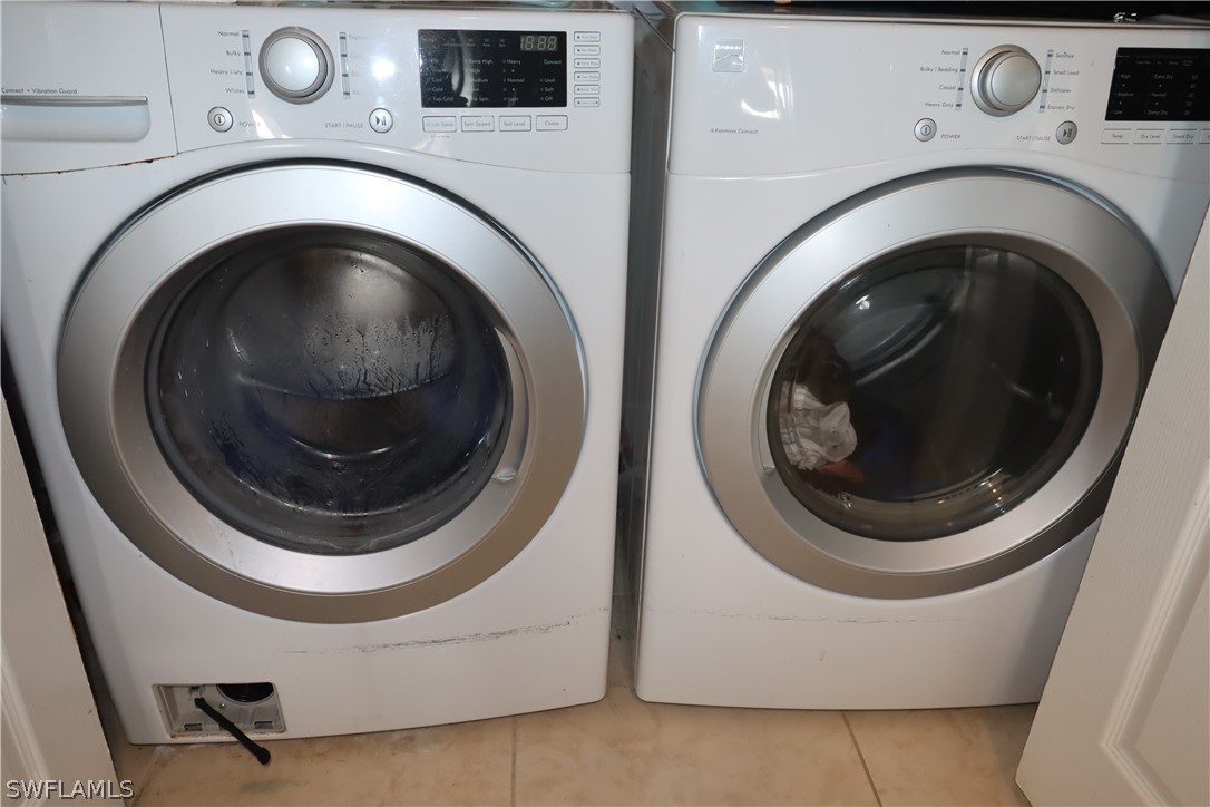 5529 Granada Road Fort Myers, FL 33919 - Photo 21 of 29 a utility room with dryer and washer