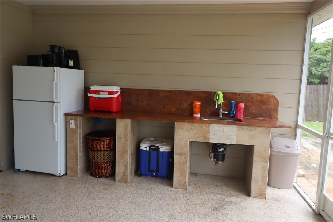 5529 Granada Road Fort Myers, FL 33919 - Photo 23 of 29 a utility room with dryer and washer
