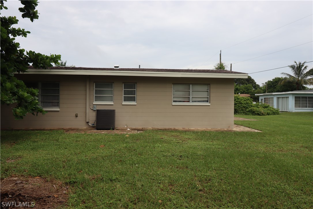 5529 Granada Road Fort Myers, FL 33919 - Photo 28 of 29 a house with a yard
