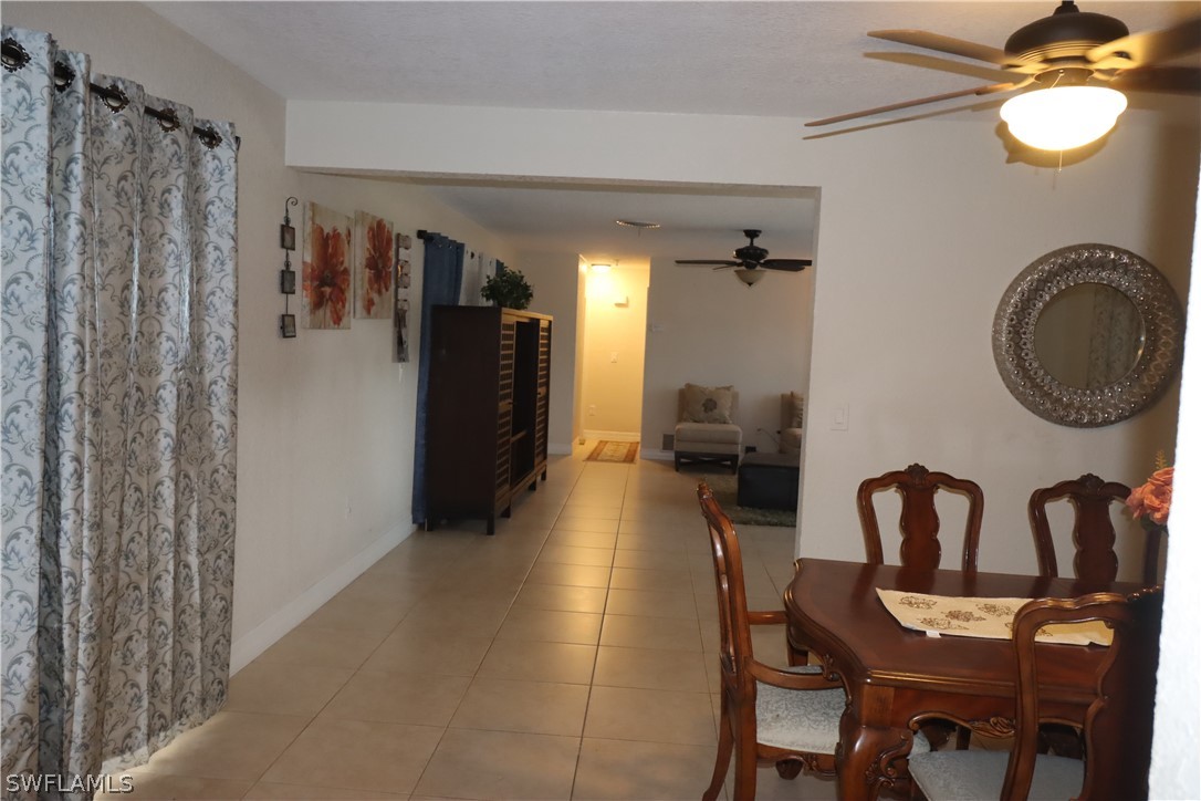 5529 Granada Road Fort Myers, FL 33919 - Photo 4 of 29 a view of a livingroom with furniture and entryway
