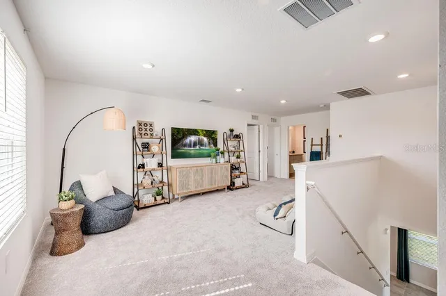 a view of livingroom with furniture and entryway